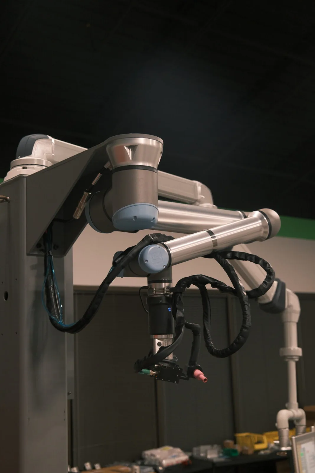 AutonoWeld M4 cobot arm with welding torch and cable management